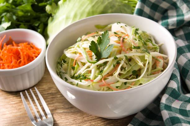 istock Coleslaw salad in white bowl 1151221217