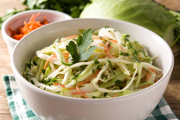istock Coleslaw salad in white bowl 1151221240