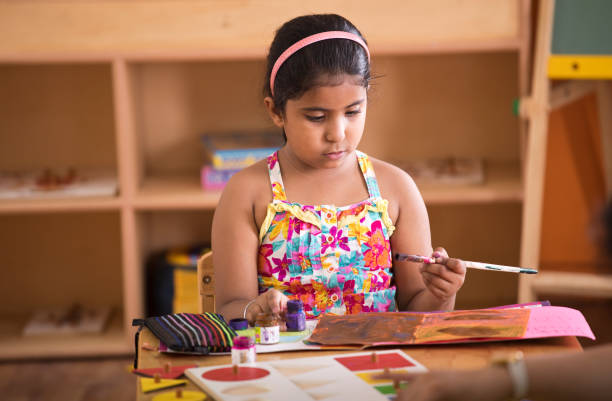 istock Indian girl drawing 1151223644