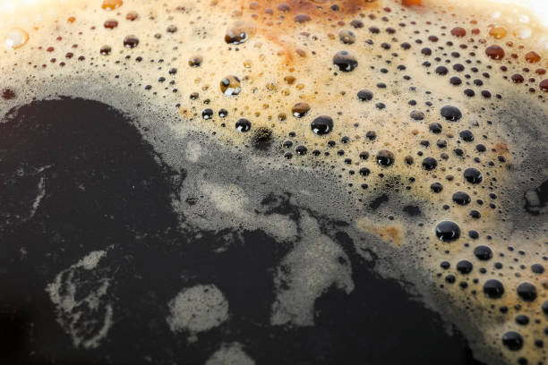 istock Coffee with foam as background, space for text and closeup 1151224088