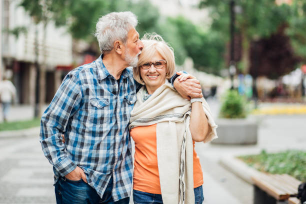 istock Man kissing his wife 1151225817