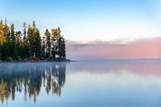 istock Early Morning Fog on a Lake 1151226843