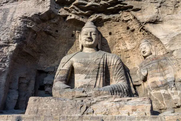 Photo of Buddha statue at Yungang grottoes in datong, Shanxi province, China