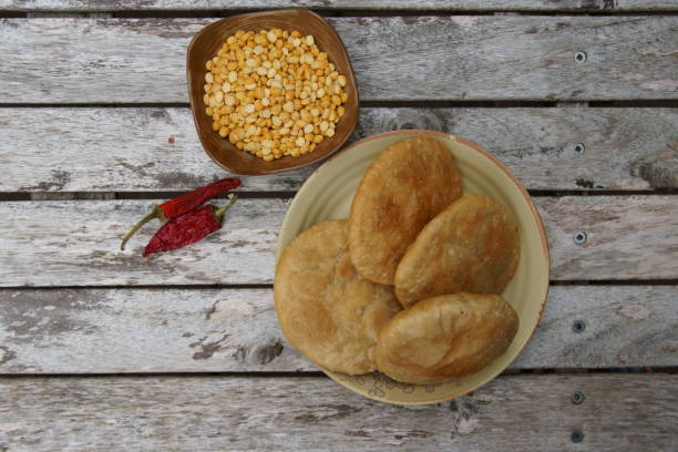 istock A deep fried poori or kachauri with sicy lenti filling. 1151231851