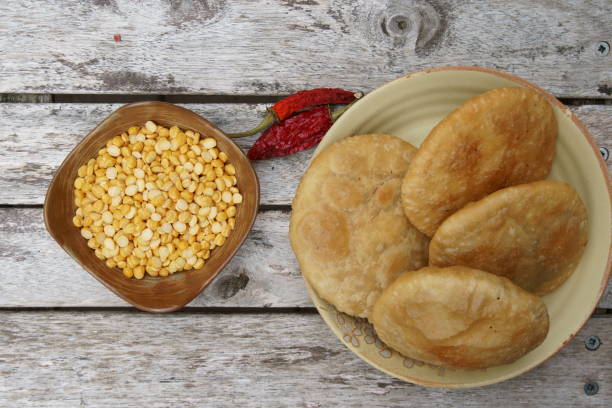 istock A deep fried poori or kachauri with sicy lenti filling. 1151231907
