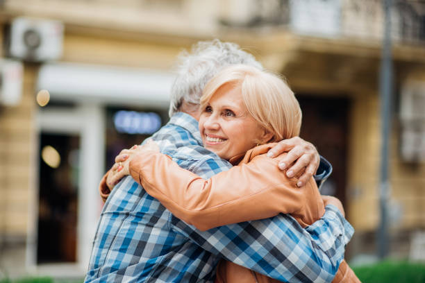 istock Woman hugging her husband 1151233807