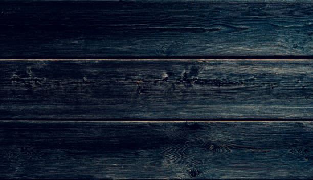 istock dark blue wood background 1151233913