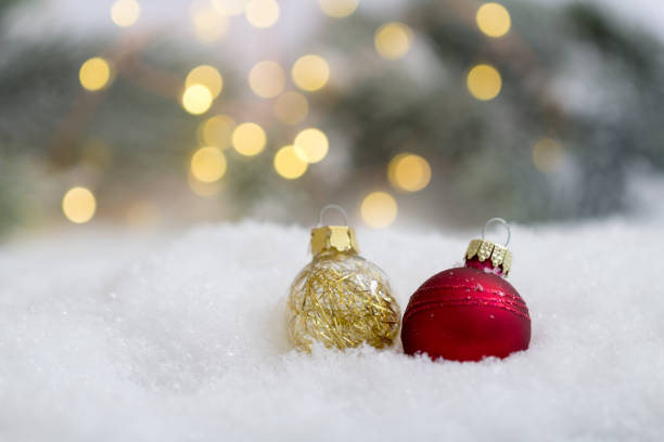 istock Chrismas tree balls in the snow 1151235009