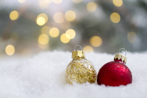 istock Chrismas tree balls in the snow 1151235543