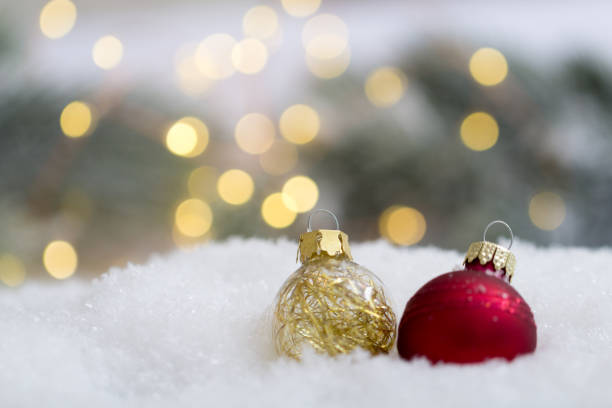 istock Chrismas tree balls in the snow 1151235599