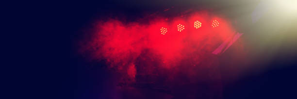 istock Stage lighting at a rock band's night concert. 1151236222