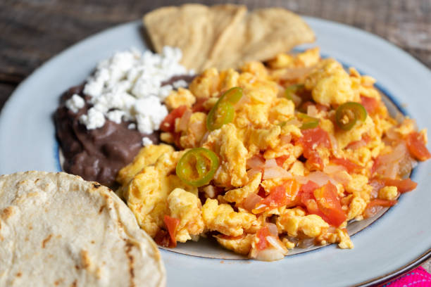 istock Mexican style scrambled eggs with fried beans, cheese and jalapeno 1151237385