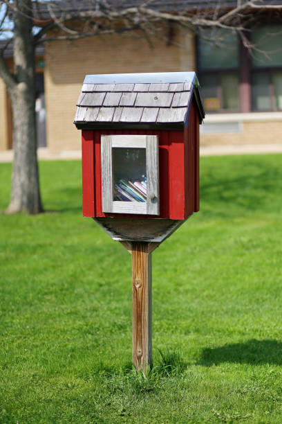 Little Neighborhood Book Sharing Library in Front of Elementary School stock photo