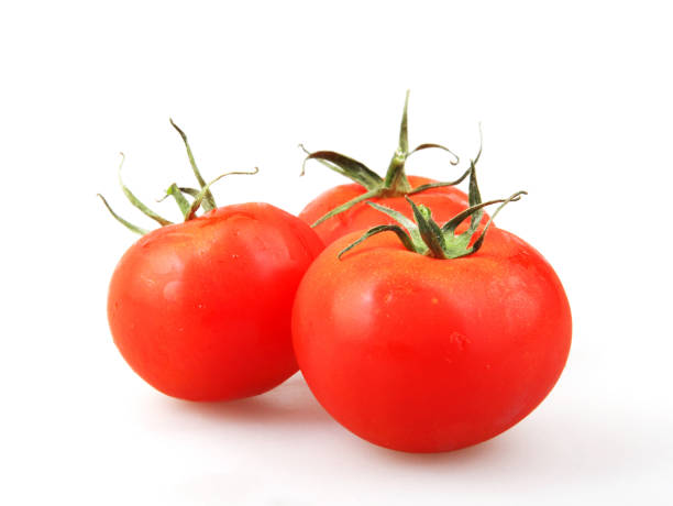 istock Close-Up Of Red Tomato On White Background 1151245423