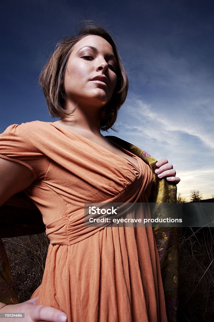 Retrato de mujer joven invierno atardecer - Foto de stock de Adolescente libre de derechos