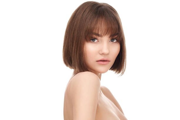 istock Beautiful brunette women with clean make up on white background 1151250429