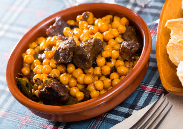 istock Stewed beef with chickpea in clay bowl 1151251031