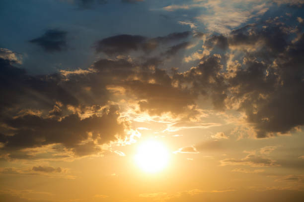istock Large heavy clouds slowly float across the blue beautiful sky. Stunning landscape and view. Blue sky with white clouds. 1151252447