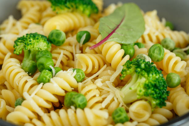 istock Pasta with broccoli and green peas 1151253027