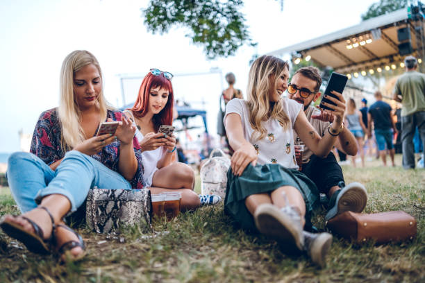 istock Using phones on a music festival 1151255227
