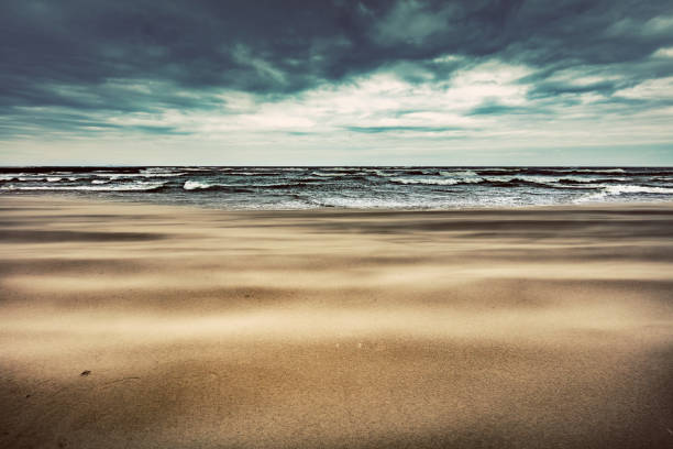Sandy beach on stormy day by the sea. Baltic Sea in Ustka Poland