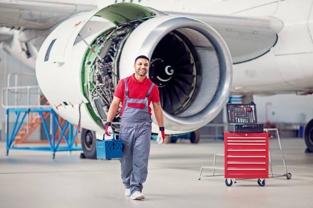 istock Aircraft mechanic working in the airplane hangar 1151260032