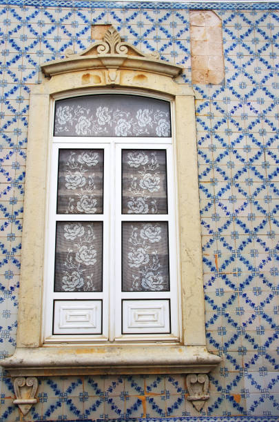 istock portuguese window on a tile painted wall 1151262515