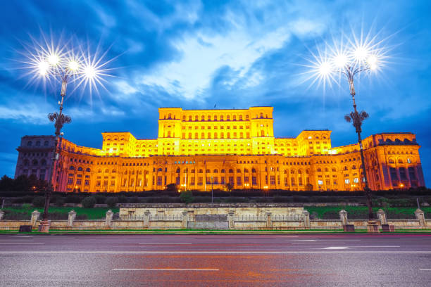 Parliament of  Bucharest Illuminated Palace of the Parliament of  Bucharest at night. Dramatic evening view of Palace of the Parliament Bucharest city, Romania, Europe parliament palace in bucharest romania the largest building in europe stock pictures, royalty-free photos & images