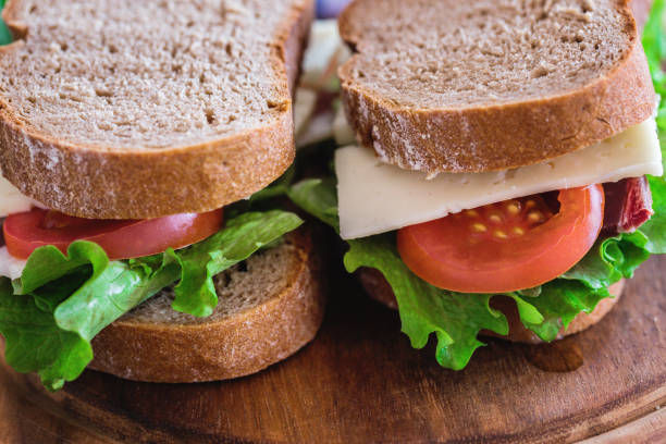 istock Simple breakfast, vegetable sandwiches with cheese and prosciutto 1151266767