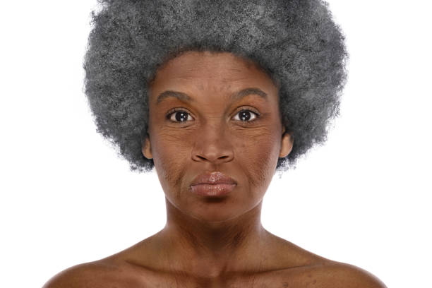 Elderly African woman on white background