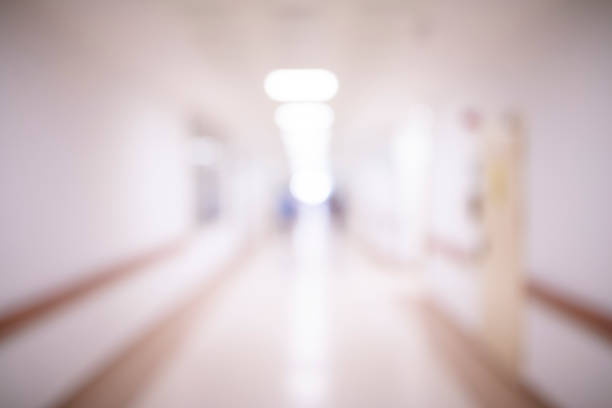 istock Abstract blur hospital corridor defocused Medical background 1151276205