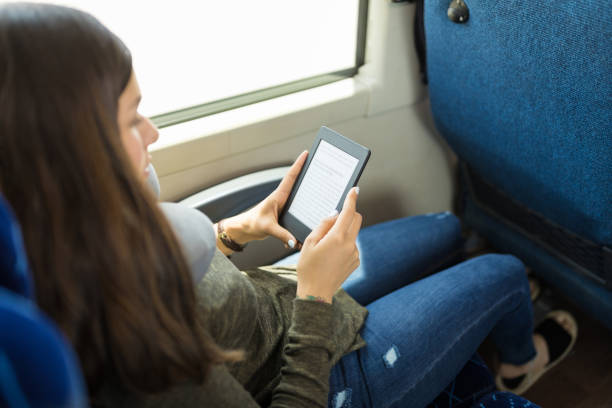istock Woman With E-book During Trip 1151279052