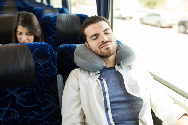 istock Tired Traveler On Bus Ride 1151279114