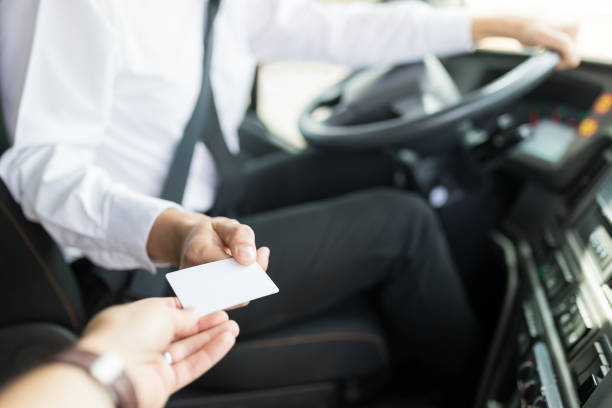istock Bus Driver Accepting Ticket From Tourist 1151279864