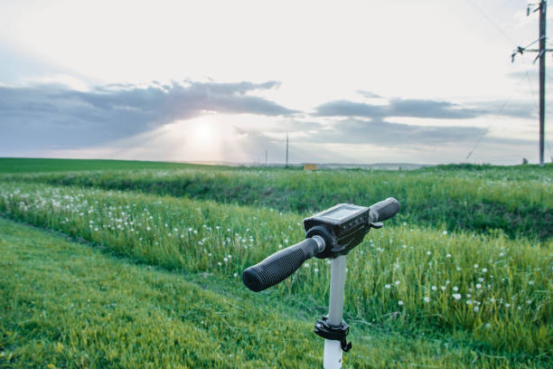 istock Electric scooter on nature sunset landscape. ecological transport 1151280938