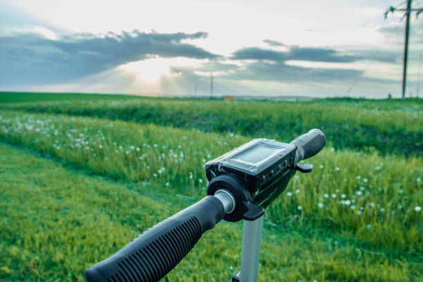 istock Electric scooter on nature sunset landscape. ecological transport 1151281117