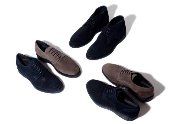 istock Layout of three pairs suede derby shoes 1151284287