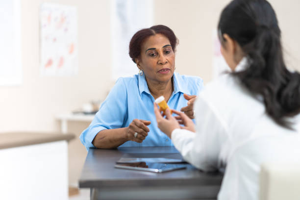 istock Senior woman gets pills 1151287465
