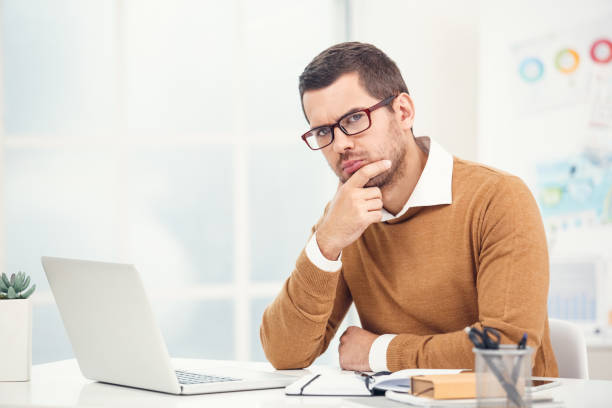 istock Young stylish business man in the ofiice 1151287691