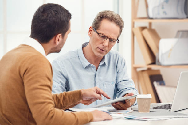 istock Two business men together in the office 1151287692