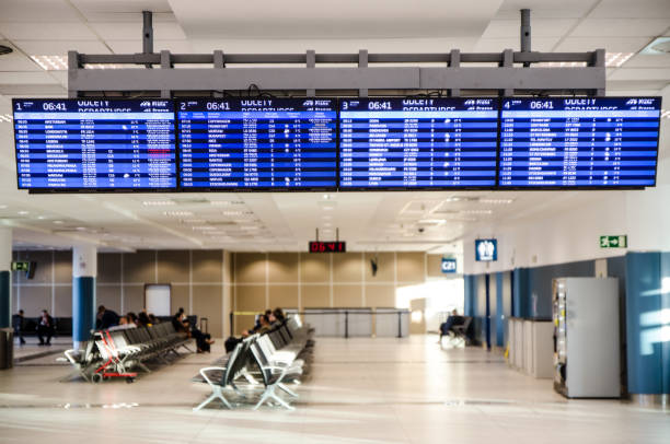 Prague Airport Departure Zone with sign indication and people waiting during day
