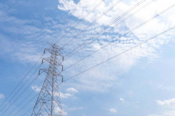 istock Electricity concept. Close up high voltage power lines station. 1151296022