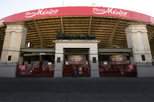 Mexico City, Mexico - 2019: People stand in front of Plaza de Toros México, the world's largest bullring.
