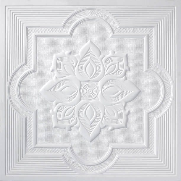 istock Patterns on the ceiling gypsum sheets of white flowers. 1151300405