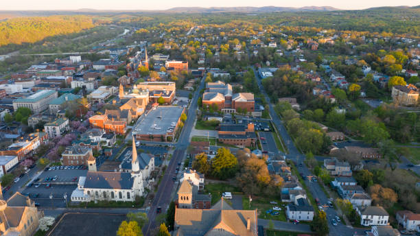 Aerial Perspective Over Downtown Lynchburg Virginia at Days End Long shadows light up the buildings in the hilltop village of Lynchburg Virgina town stock pictures, royalty-free photos & images