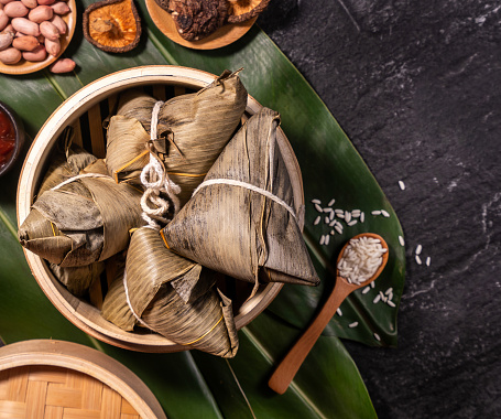 Zongzi, delicious fresh hot steamed rice dumplings in steamer. Close up, copy space, famous asian tasty food in dragon boat duanwu festival