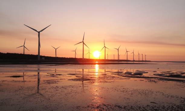 istock sunset of wind farm 1151303640