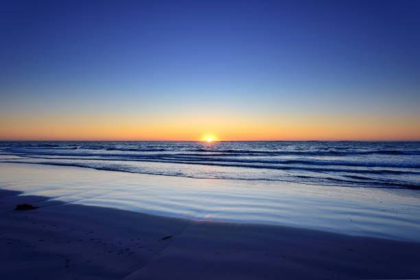 istock Beach and Indian Ocean at Sunset, West Australia 1151304562