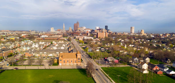 Aerial View Cleveland Downtown Skyline Storm Approaching Aerial View Lake Erie next to the downtown city skyline of Cleveland Ohio river cuyahoga stock pictures, royalty-free photos & images