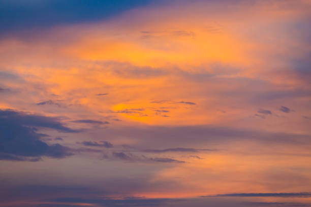 istock Blue orange and yellow colorful sunset sky 1151312217